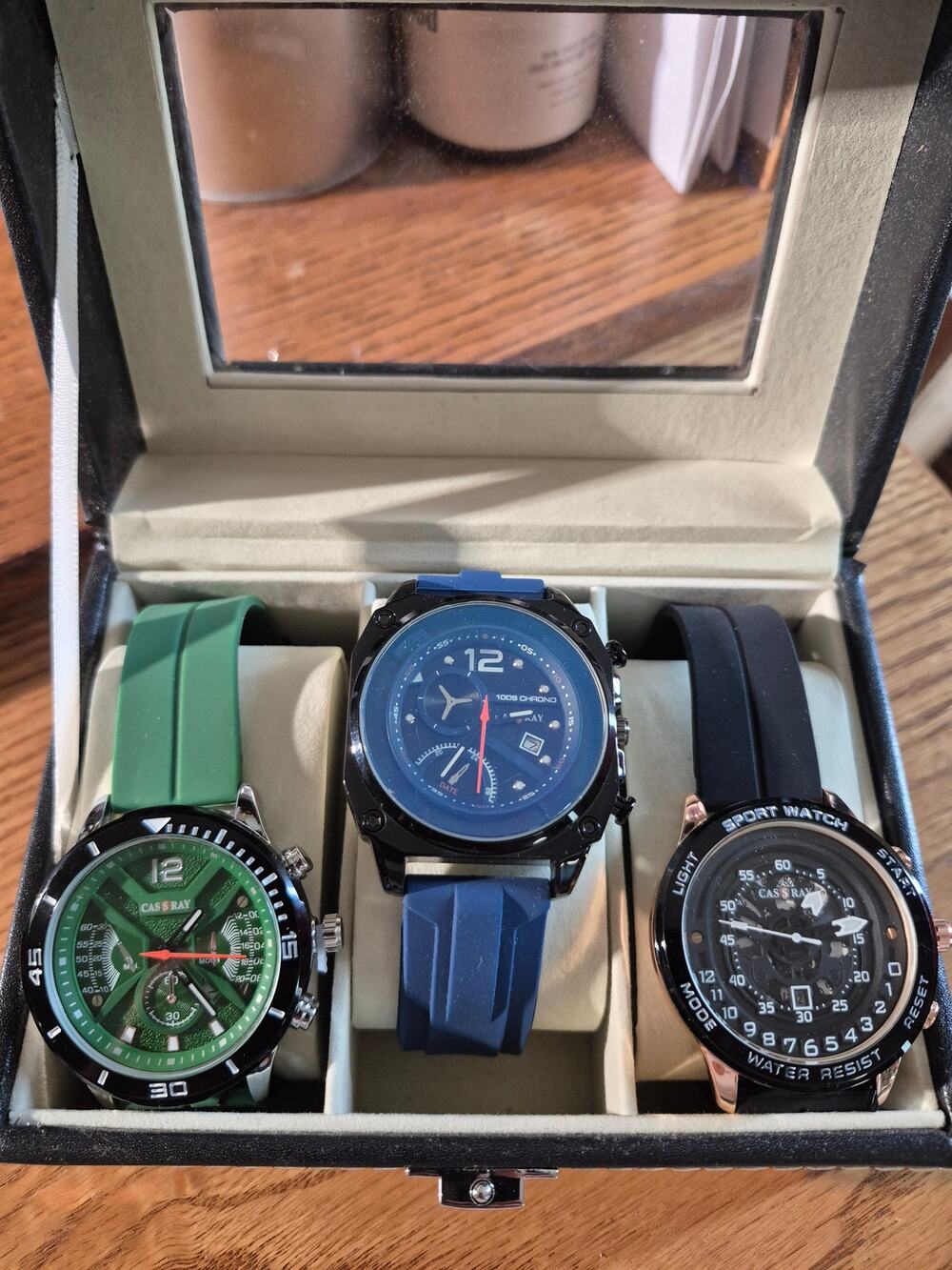Three Cassray Watches in Display Case